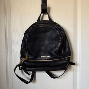 Michael Kors Black Leather Backpack with Gold Accents